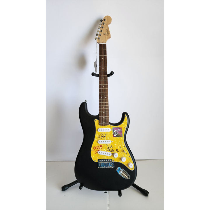 Eric Clapton, Ginger Baker, Jack Bruce, Cream, authentic Fender Stratocaster electric guitar signed with proof