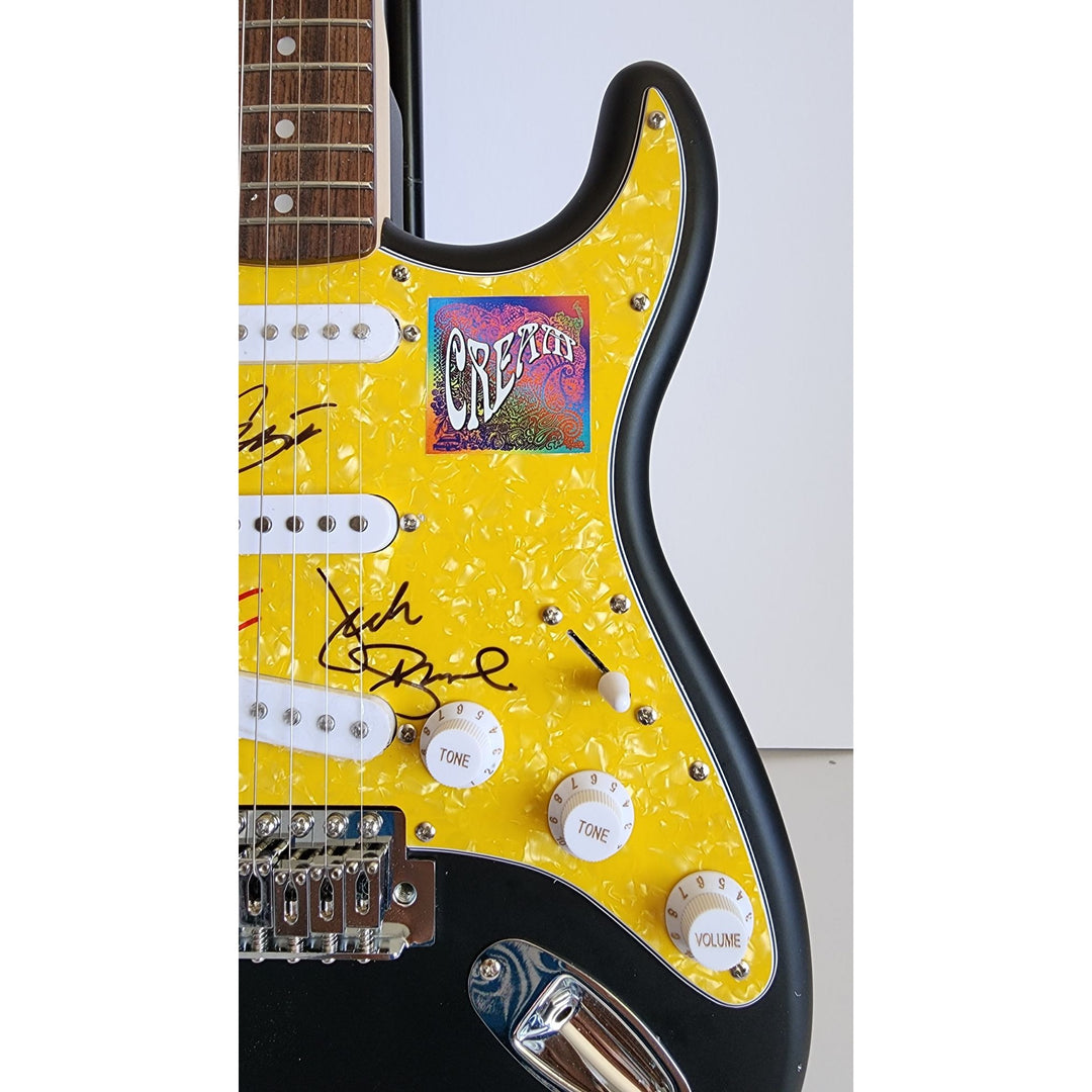 Eric Clapton, Ginger Baker, Jack Bruce, Cream, authentic Fender Stratocaster electric guitar signed with proof