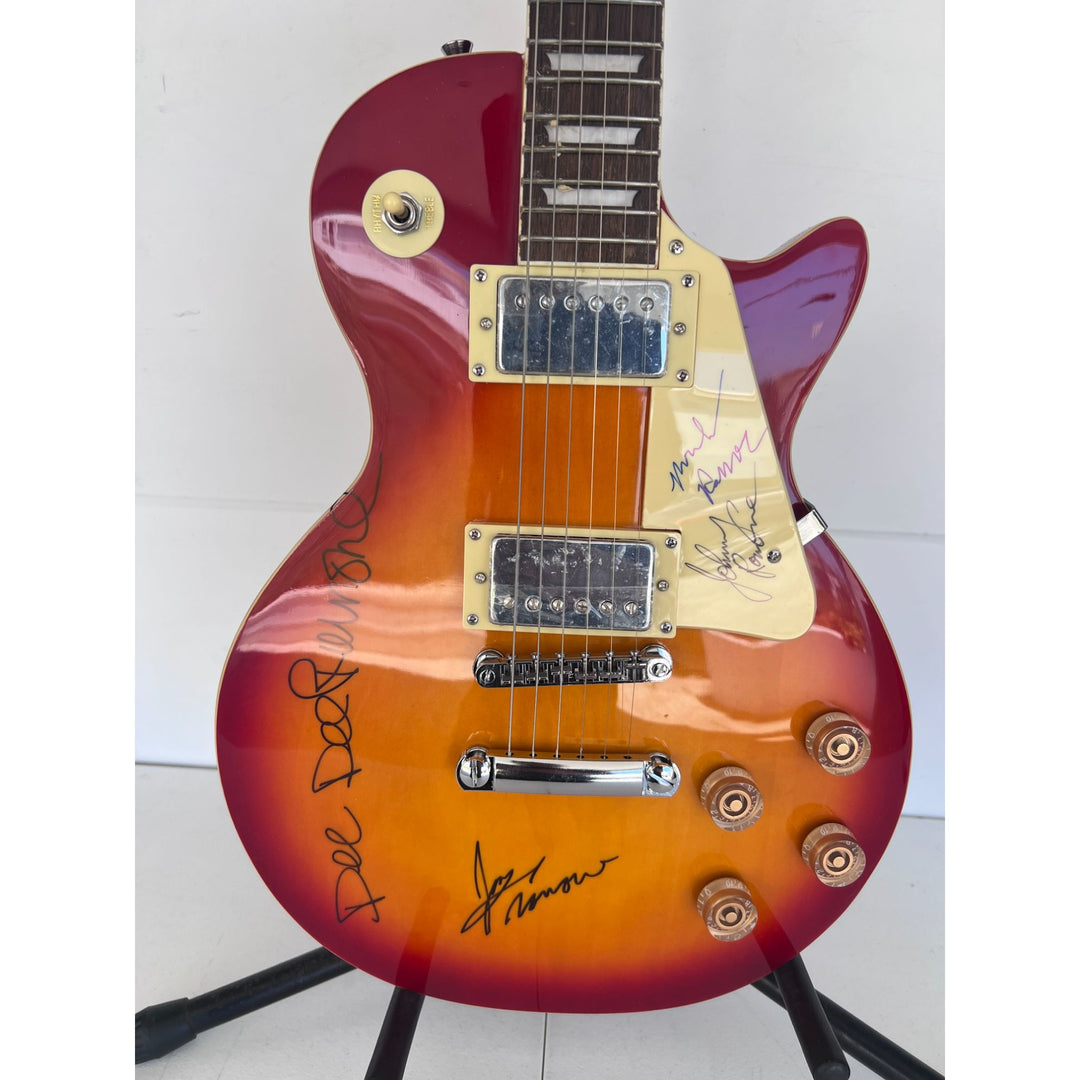 The Ramones Dee-Dee Ramone Joey Ramone Marky Ramone Johnny Ramone Tommy Ramone Richie Ramone vintage les paul signed with proof.