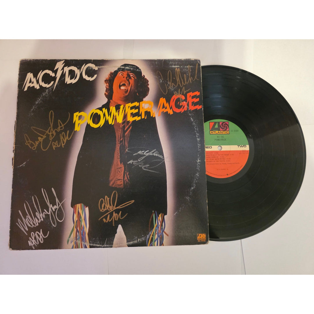 Angus young Malcolm Young Brian Johnson Cliff Williams Phil Rudd ACDC "Power Rage" LP signed with proof.