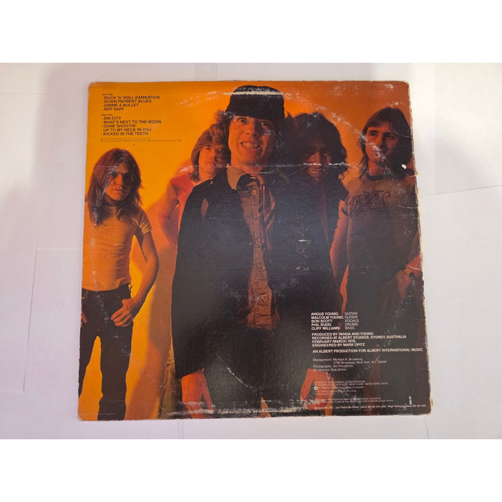 Angus young Malcolm Young Brian Johnson Cliff Williams Phil Rudd ACDC "Power Rage" LP signed with proof.