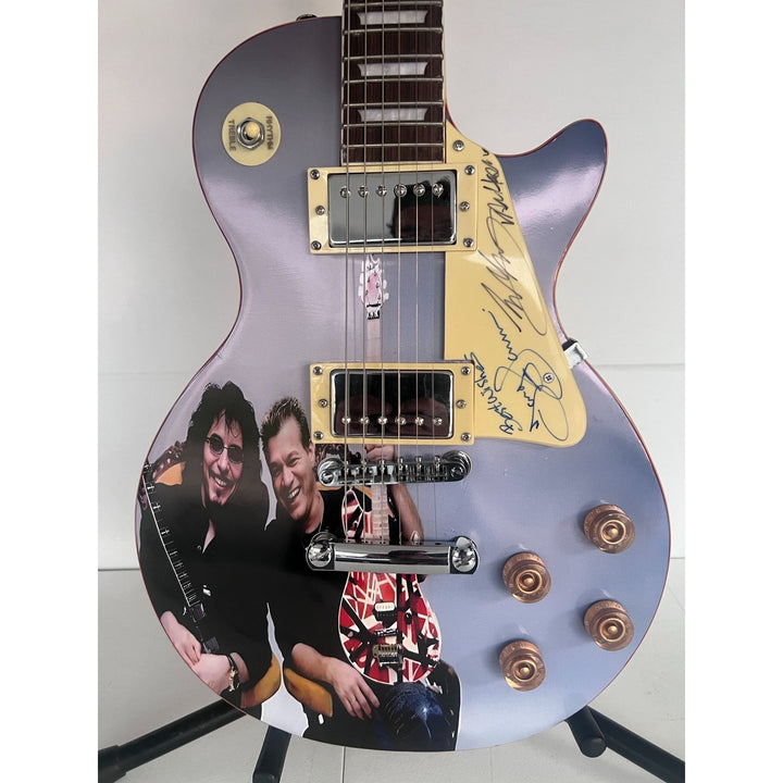 Tony Iommi (Black Sabbath) Eddie Van Halen two of Rock N' Rolls greatest guitarists one of a kind les paul signed with proof.