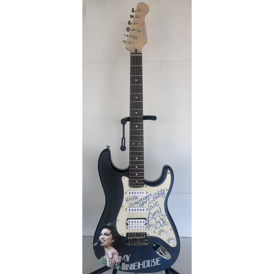 Amy Winehouse Stratocaster electric guitar signed with proof..