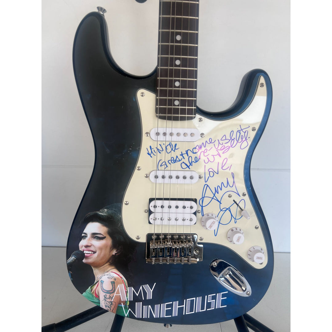 Amy Winehouse Stratocaster electric guitar signed with proof..