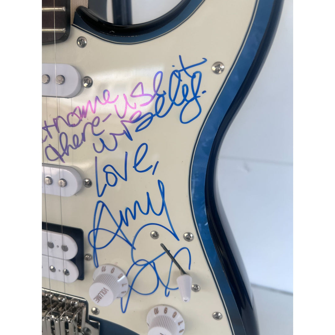 Amy Winehouse Stratocaster electric guitar signed with proof..