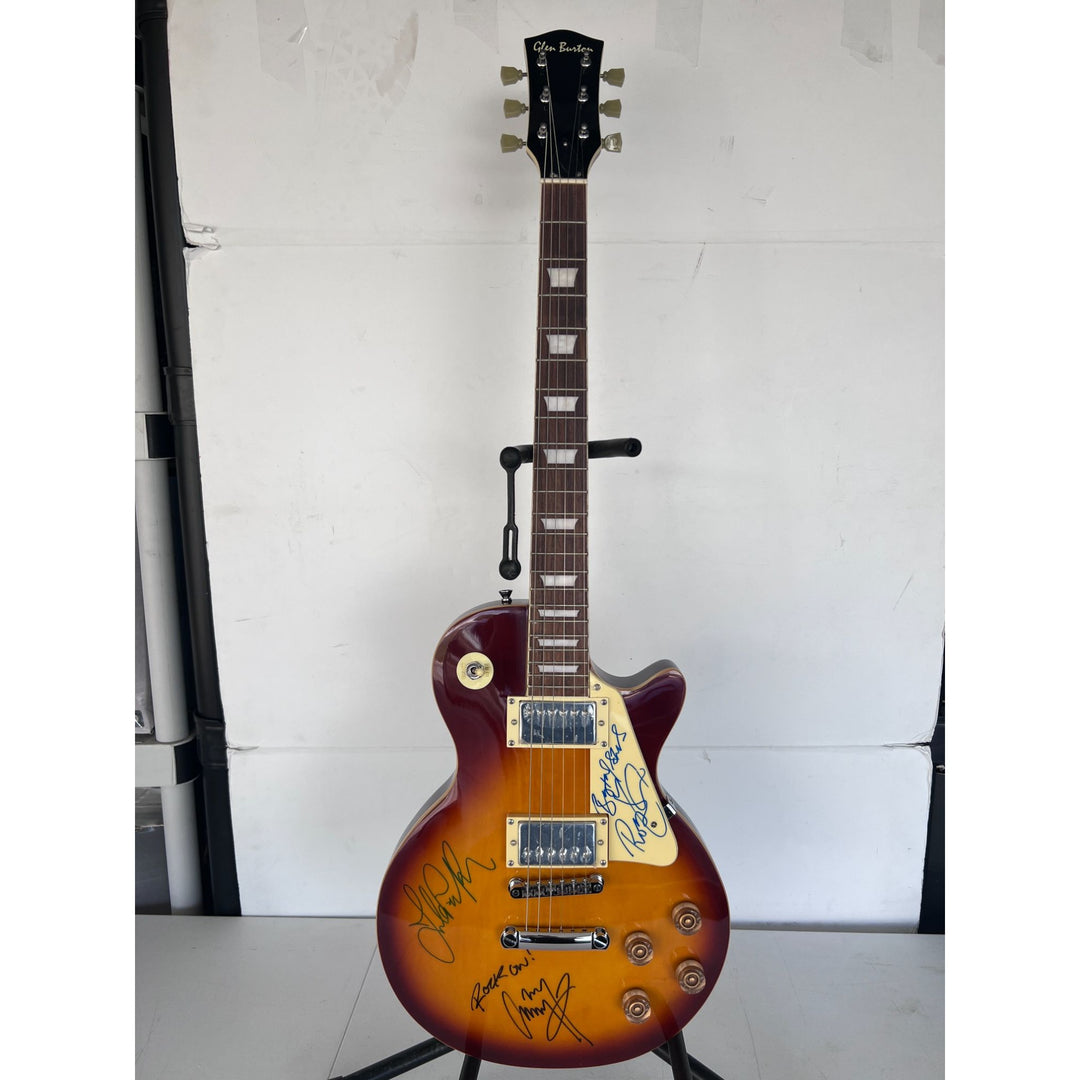 Led Zeppelin Jimmy Page with inscription Rock On! Robert Plant, and John Paul Jones vintage les paul signed with proof.