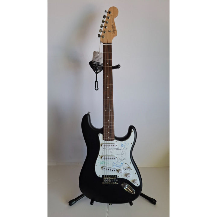 INXS: Michael Hutchence, Jon, Andrew, Tim Farriss, Garry Gary Beers, Fender Stratocaster full size electric guitar signed with proof