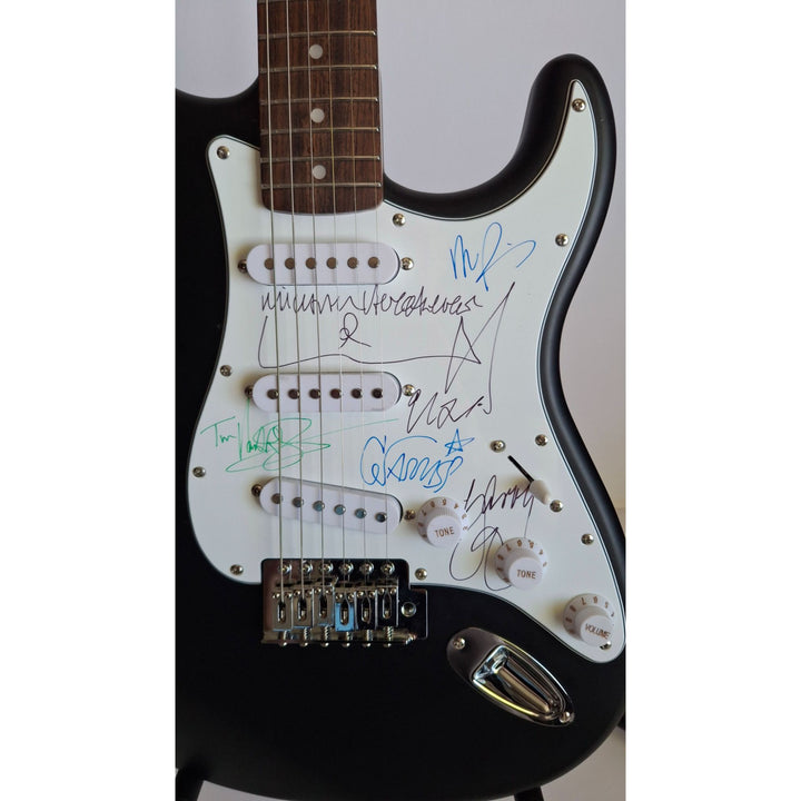 INXS: Michael Hutchence, Jon, Andrew, Tim Farriss, Garry Gary Beers, Fender Stratocaster full size electric guitar signed with proof