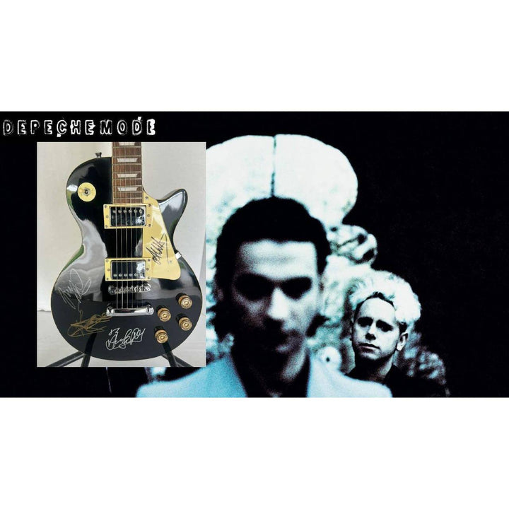 Depeche Mode Alan Wilder, Dave Gahan, Martin Gore, and Andrew Fletcher Black les paul electric guitar signed with proof