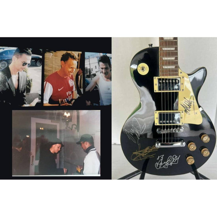 Depeche Mode Alan Wilder, Dave Gahan, Martin Gore, and Andrew Fletcher Black les paul electric guitar signed with proof