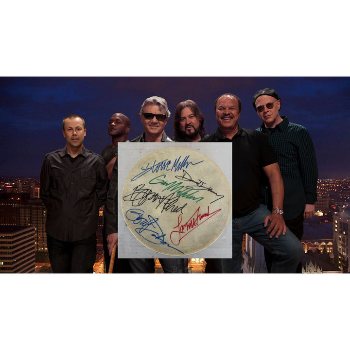 Steve Miller Band Tambourine 8" signed with proof.
