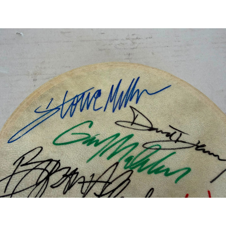 Steve Miller Band Tambourine 8" signed with proof.