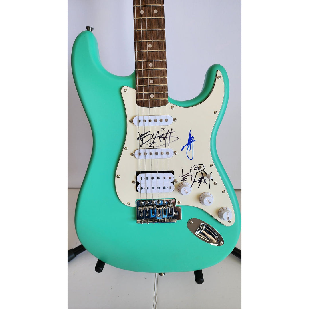 Blink 182 Travis Barker, Mark Hoppus, Tom De Longe authentic Fender Stratocaster electric guitar signed with proof