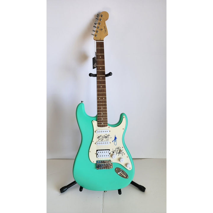 Blink 182 Travis Barker, Mark Hoppus, Tom De Longe authentic Fender Stratocaster electric guitar signed with proof