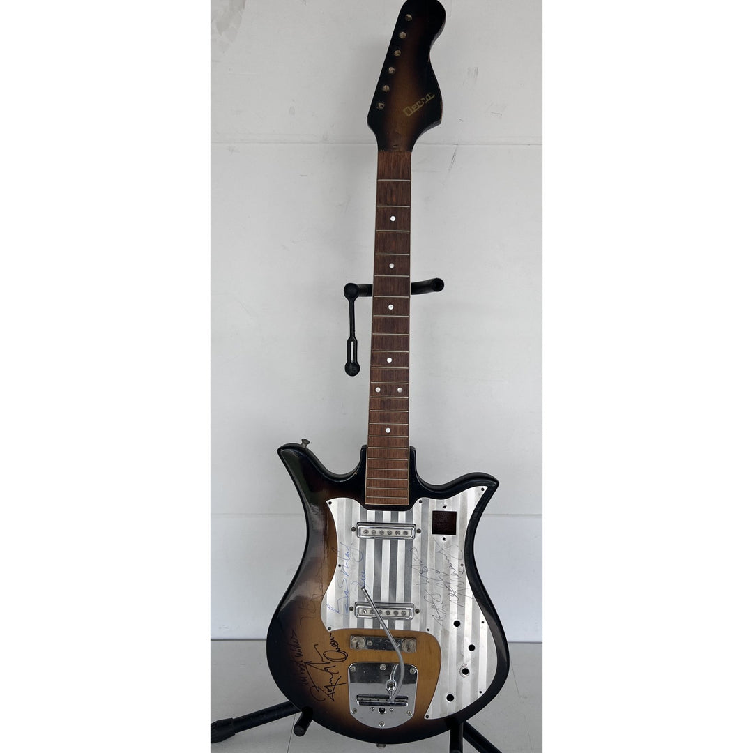 Freddie Mercury Brian May, Roger Taylor, John Deacon Queen vintage guitar signed with proof.