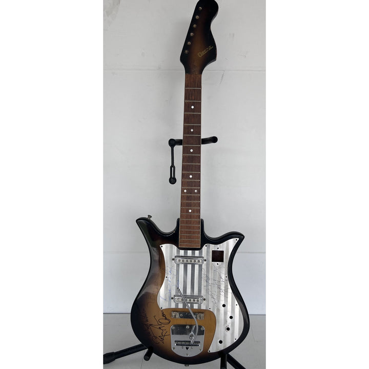 Freddie Mercury Brian May, Roger Taylor, John Deacon Queen vintage guitar signed with proof.