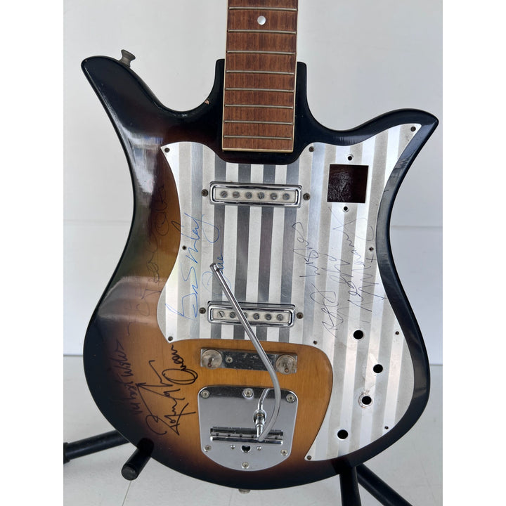 Freddie Mercury Brian May, Roger Taylor, John Deacon Queen vintage guitar signed with proof.