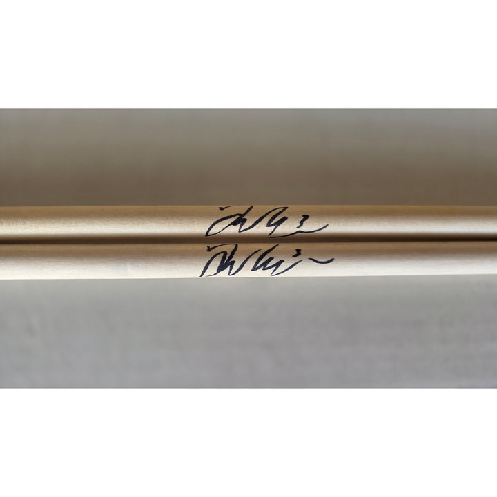 Taylor Hawkins Foo Fighters pair of drumsticks signed with proof.