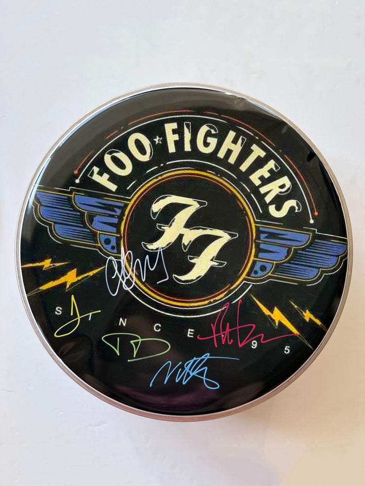 David Grohl, Taylor Hawkins, the Foo Fighters one-of-a-kind drumhead signed with proof