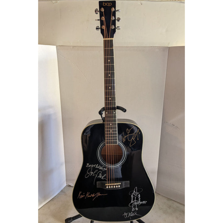 The Highwaymen Johnny Cash, Waylon Jennings, Willie Nelson w/ self sketch, and Kris Kristofferson full size acoustic guitar signed