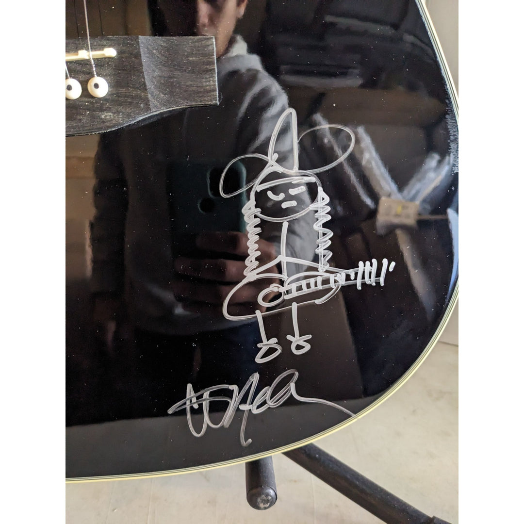 The Highwaymen Johnny Cash, Waylon Jennings, Willie Nelson w/ self sketch, and Kris Kristofferson full size acoustic guitar signed