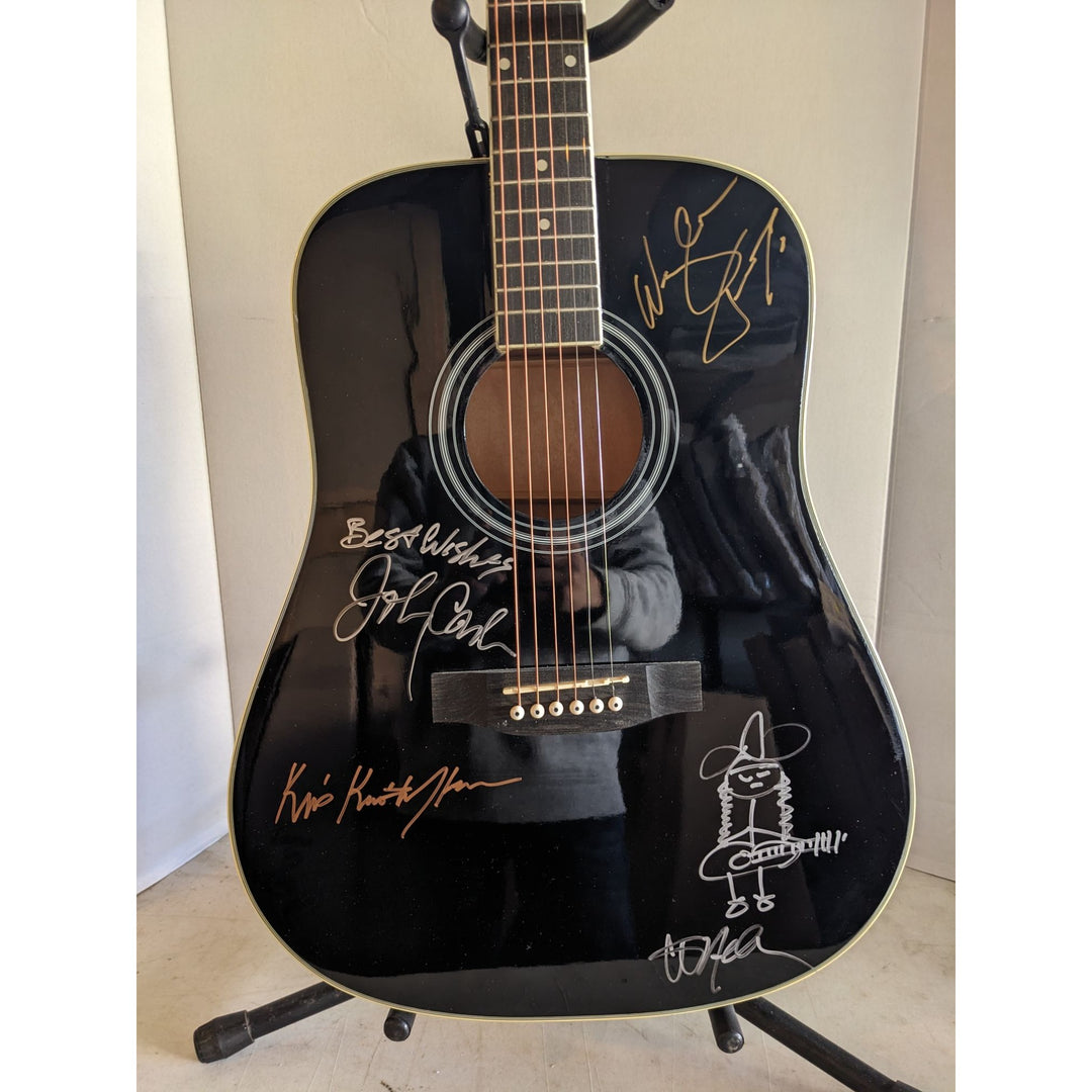 The Highwaymen Johnny Cash, Waylon Jennings, Willie Nelson w/ self sketch, and Kris Kristofferson full size acoustic guitar signed