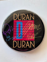 Load image into Gallery viewer, Duran Duran drumhead one-of-a-kind drumhead signed with proof
