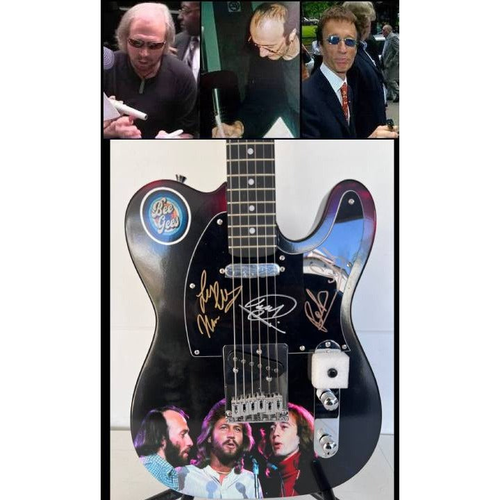 Barry, Robin and Maurice Gibb the Bee Gees  One of a Kind" telecaster full size electric guitar signed with proof.