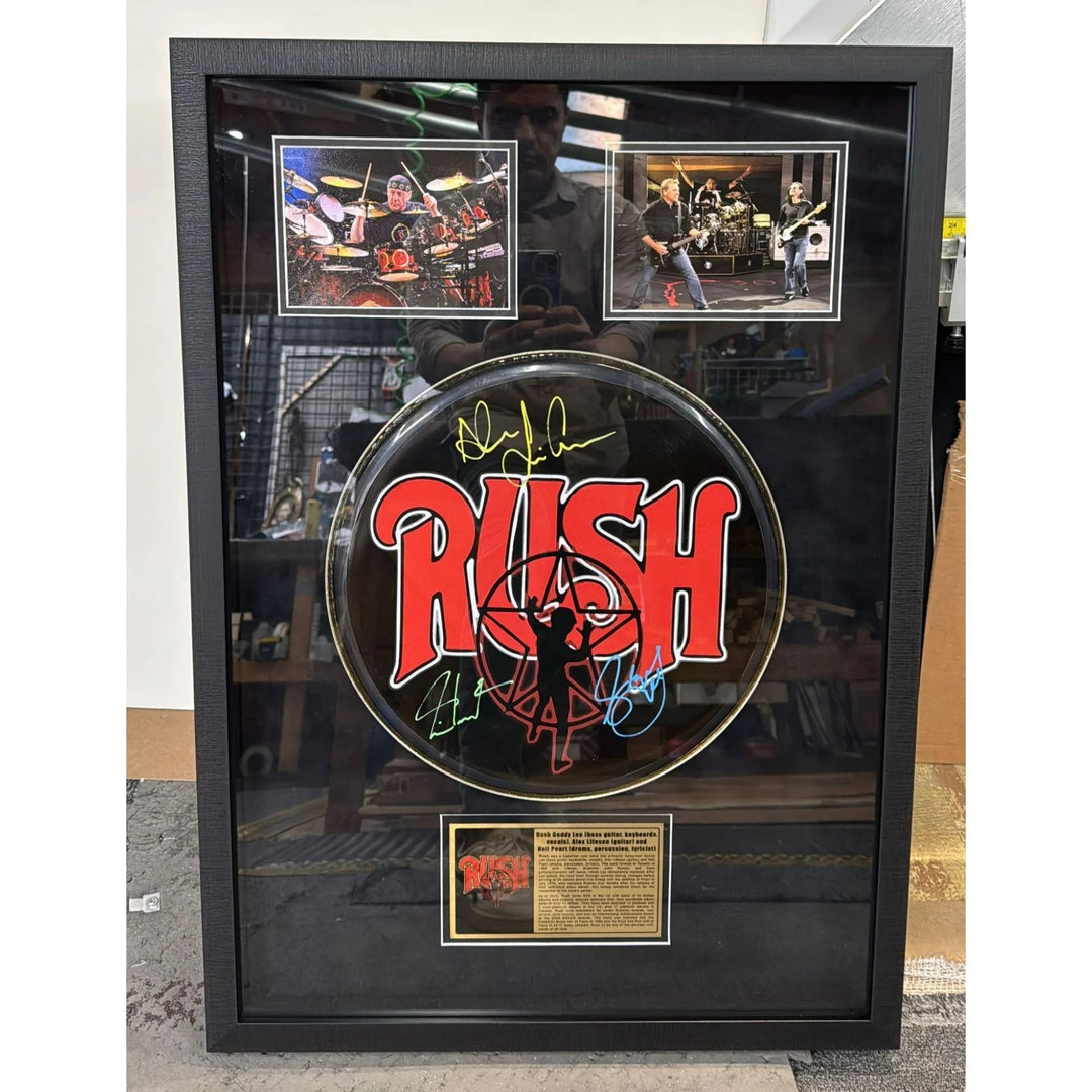 Paul McCartney Ringo Starr and Sir George Martin drumhead signed with proof.