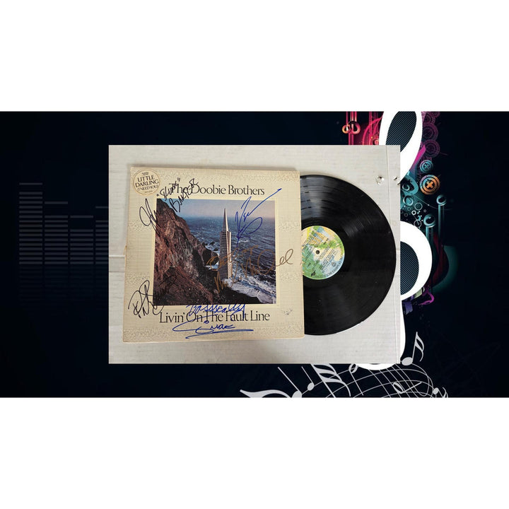 The Doobie Brothers ''Takin it to the Streets'' LP signed with proof.