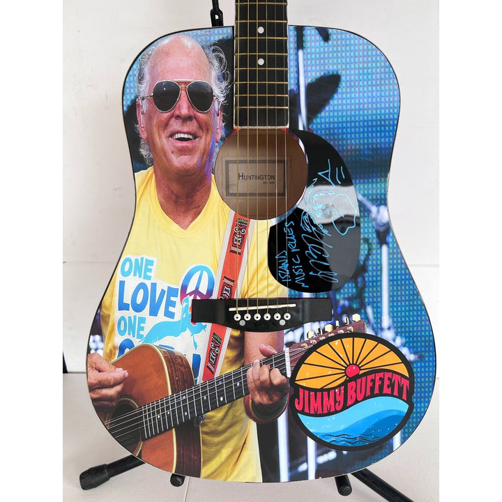 Jimmy Buffett (one of a kind ) full size acoustic guitar  signed with proof.
