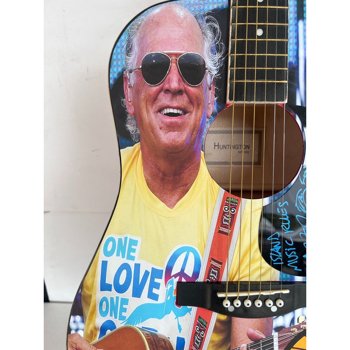 Jimmy Buffett (one of a kind ) full size acoustic guitar  signed with proof.