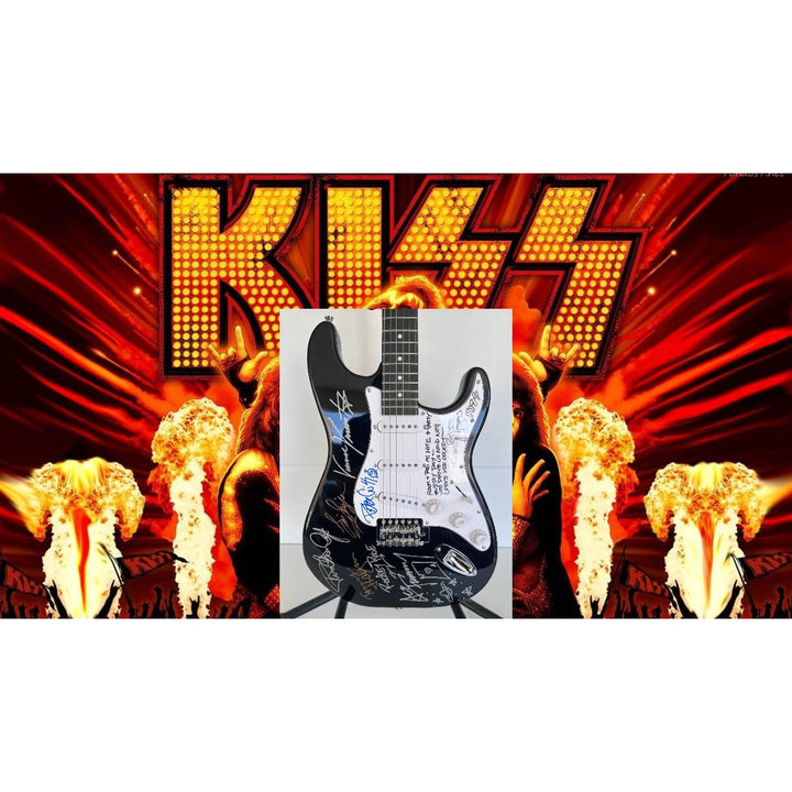 Kiss, Gene Simmons, Paul Stanley, Peter Chris, Ace Frehley  electric guitar signed with proof.