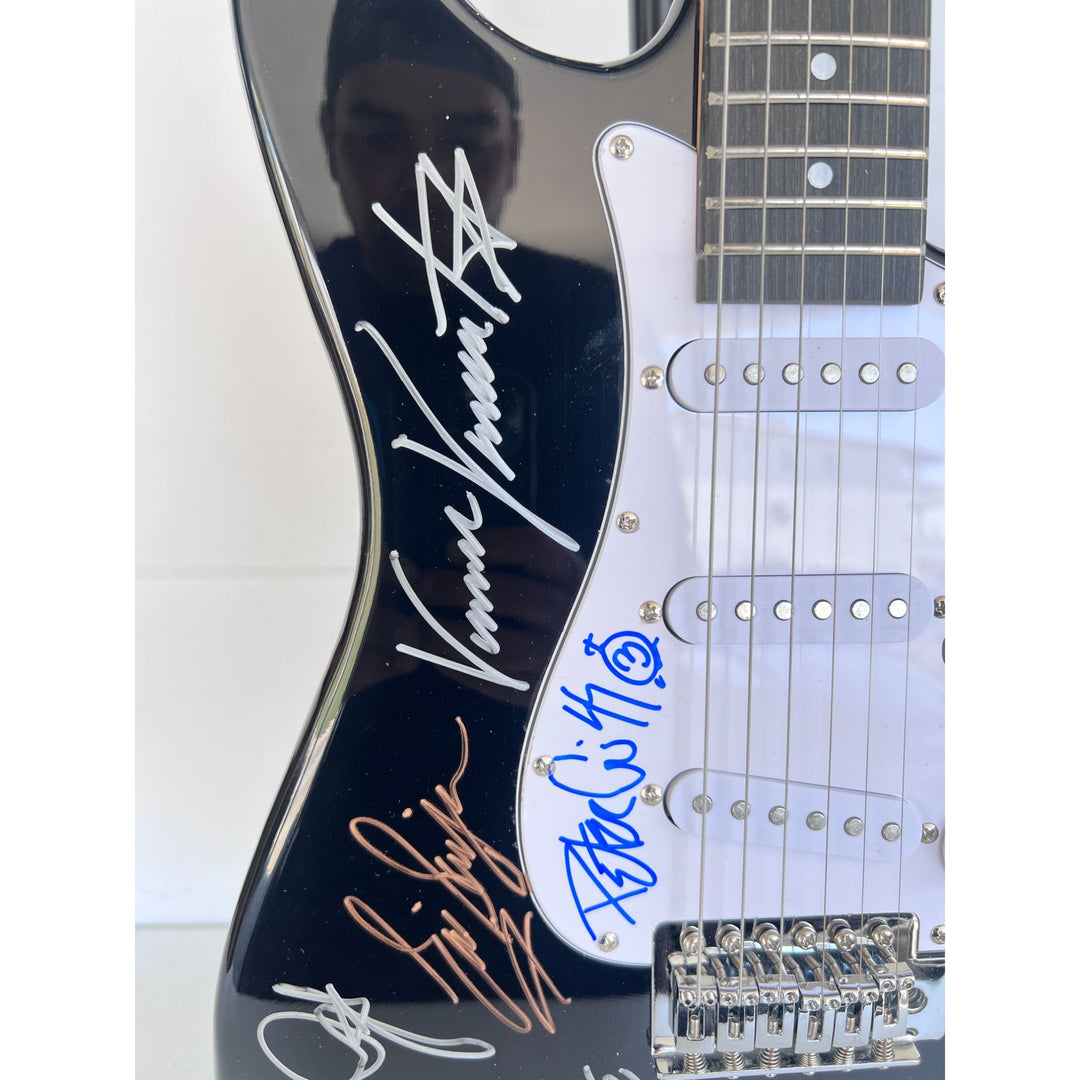 Kiss, Gene Simmons, Paul Stanley, Peter Chris, Ace Frehley  electric guitar signed with proof.