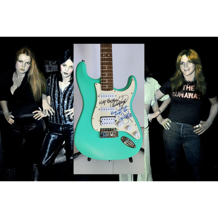 Lita Ford & Joan Jett, signed with inscriptions authentic Fender Stratocaster electric guitar signed with proof