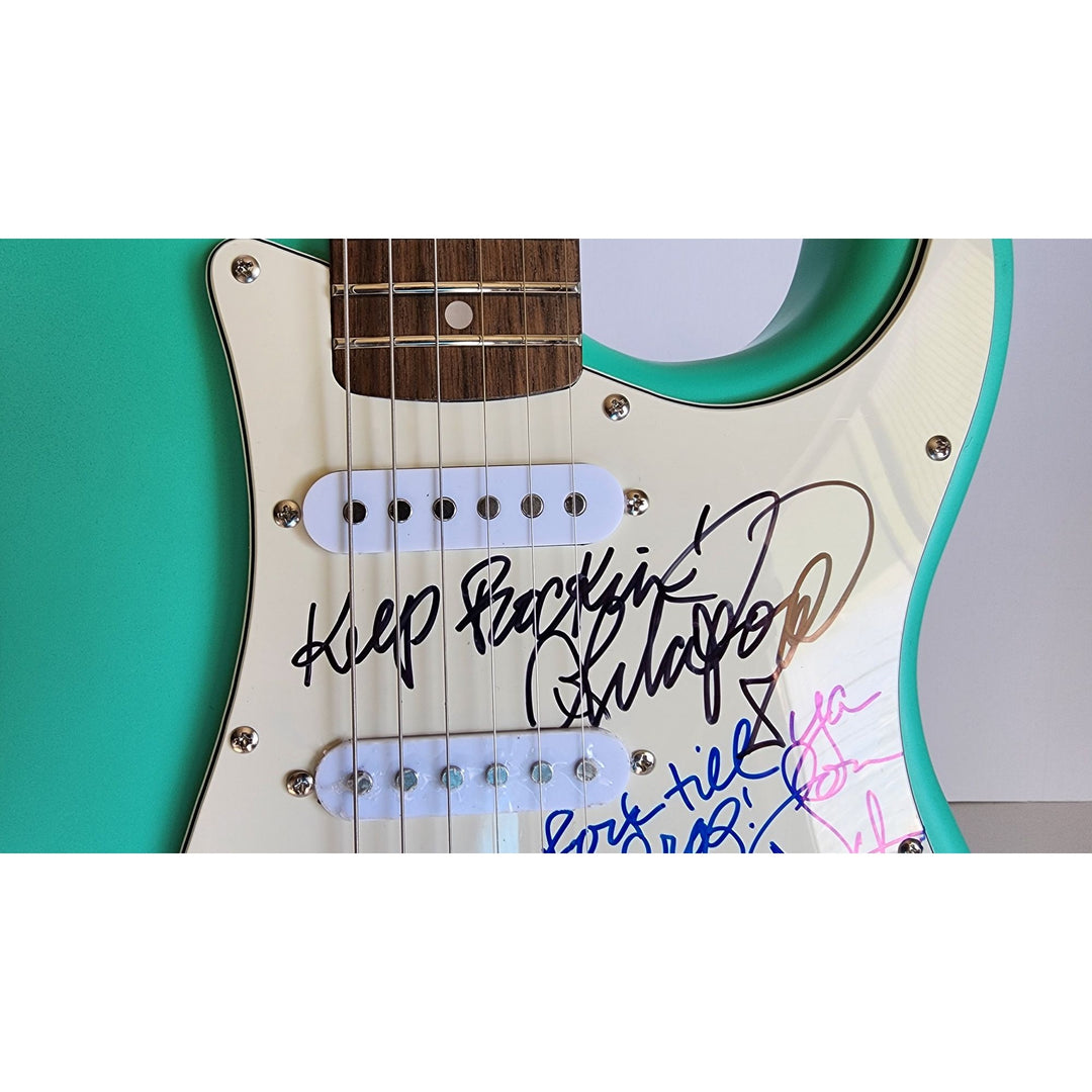 Lita Ford & Joan Jett, signed with inscriptions authentic Fender Stratocaster electric guitar signed with proof