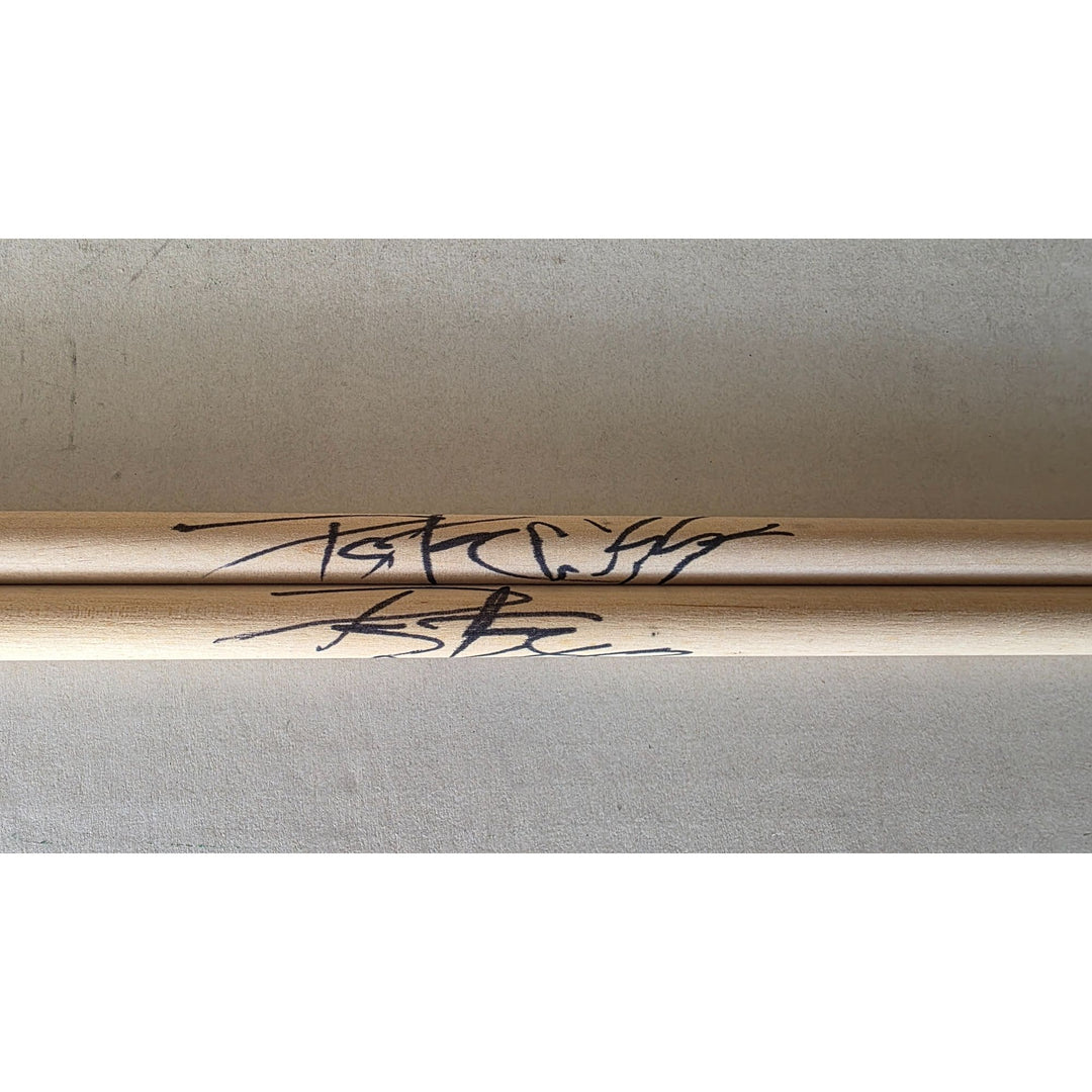 Peter Criss of kiss Drumsticks signed with proof.