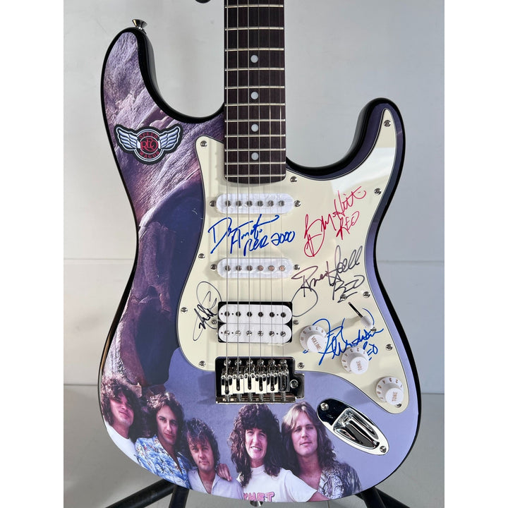 Reo Speedwagon Kevin Cronin, Dave Amato, Bruce Hall, Brian Hitt and Derek Hilland Stratocaster (one of a kind) electric guitar signed.