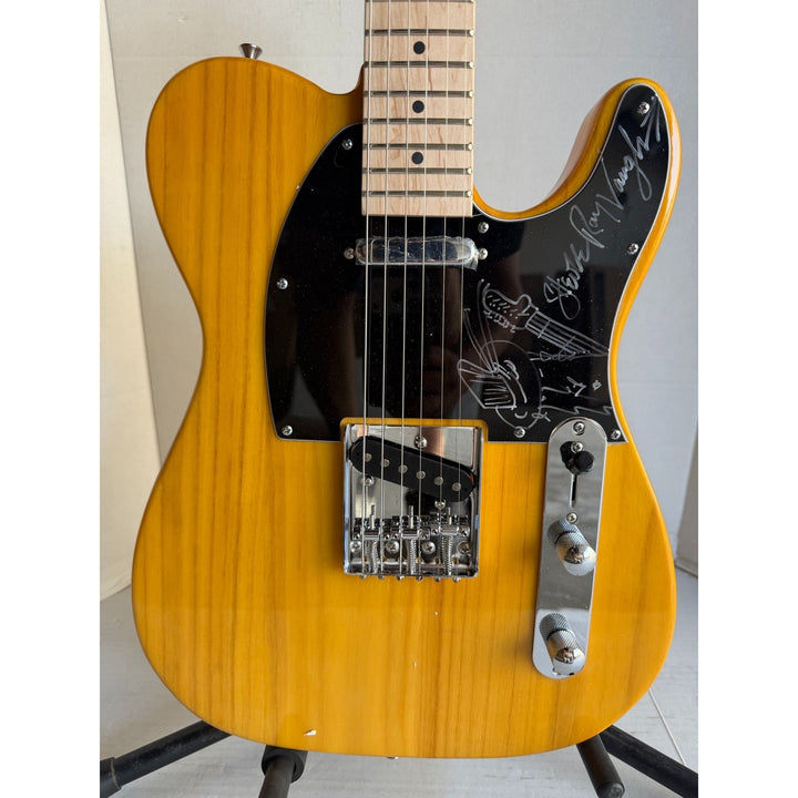 Stevie Ray Vaughan full size telecaster electric guitar signed with proof and sketch.