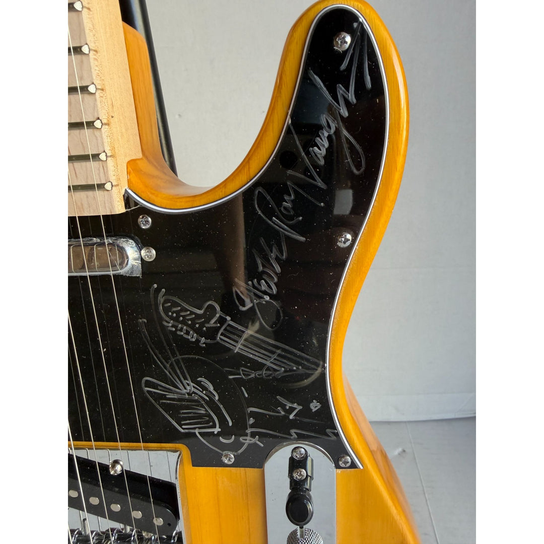 Stevie Ray Vaughan full size telecaster electric guitar signed with proof and sketch.