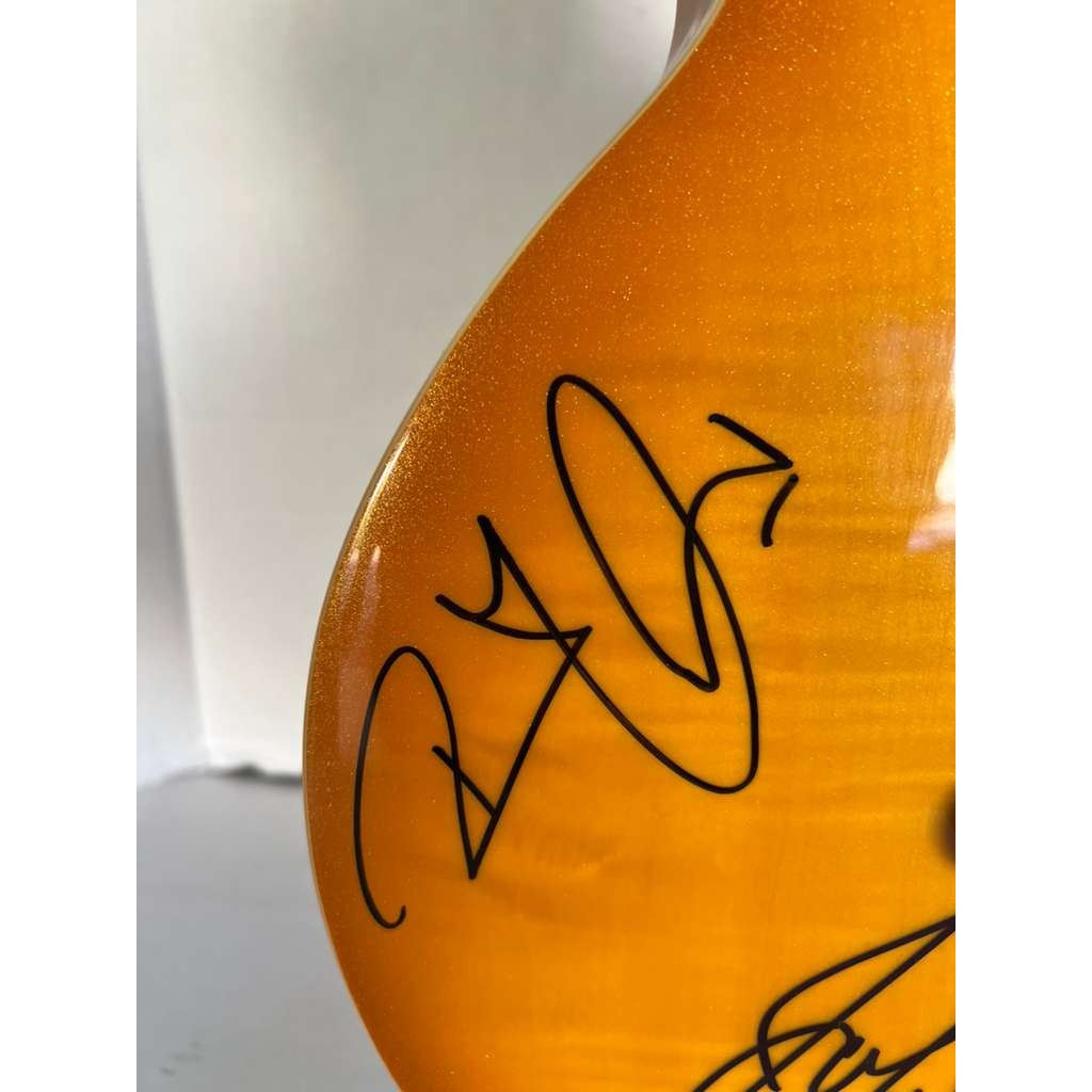 Jimmy Page, Robert Plant, John Paul Jones Led Zeppelin  gold les paul electric guitar signed with proof.
