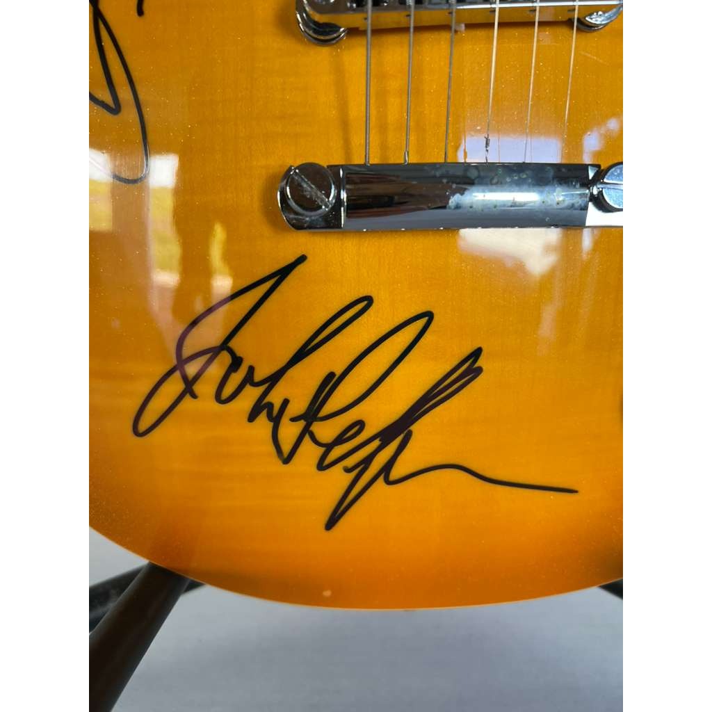 Jimmy Page, Robert Plant, John Paul Jones Led Zeppelin  gold les paul electric guitar signed with proof.