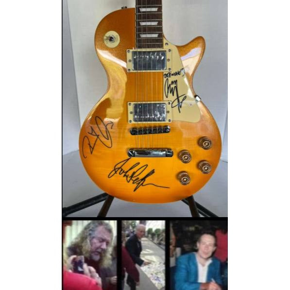 Jimmy Page, Robert Plant, John Paul Jones Led Zeppelin  gold les paul electric guitar signed with proof.
