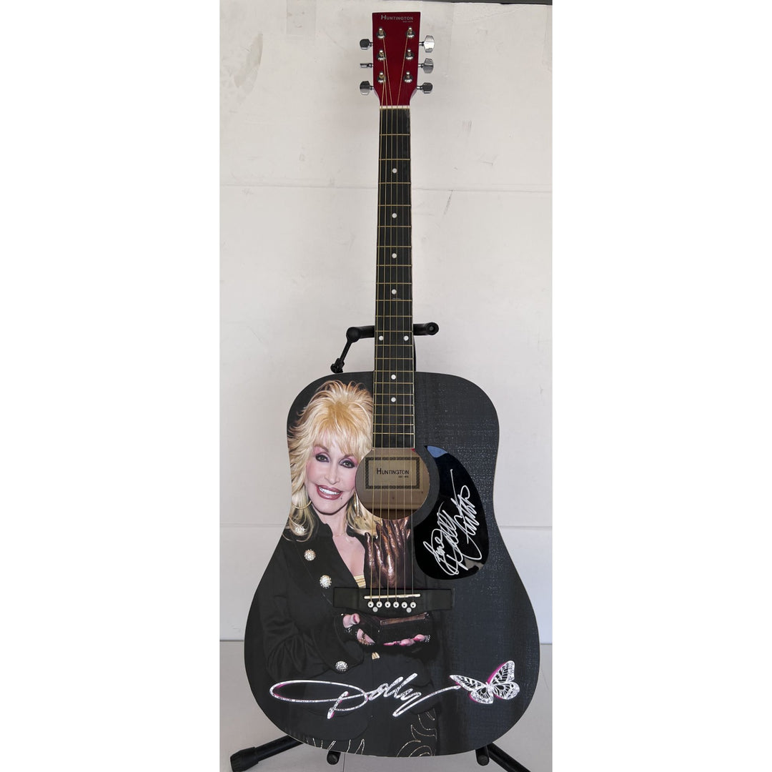 Dolly Parton (one of a kind ) full size acoustic guitar signed with proof .