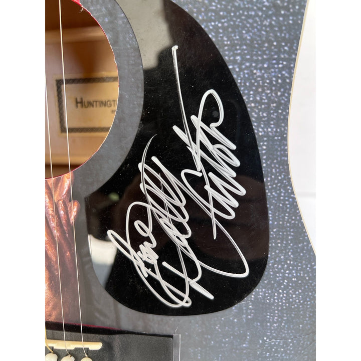Dolly Parton (one of a kind ) full size acoustic guitar signed with proof .