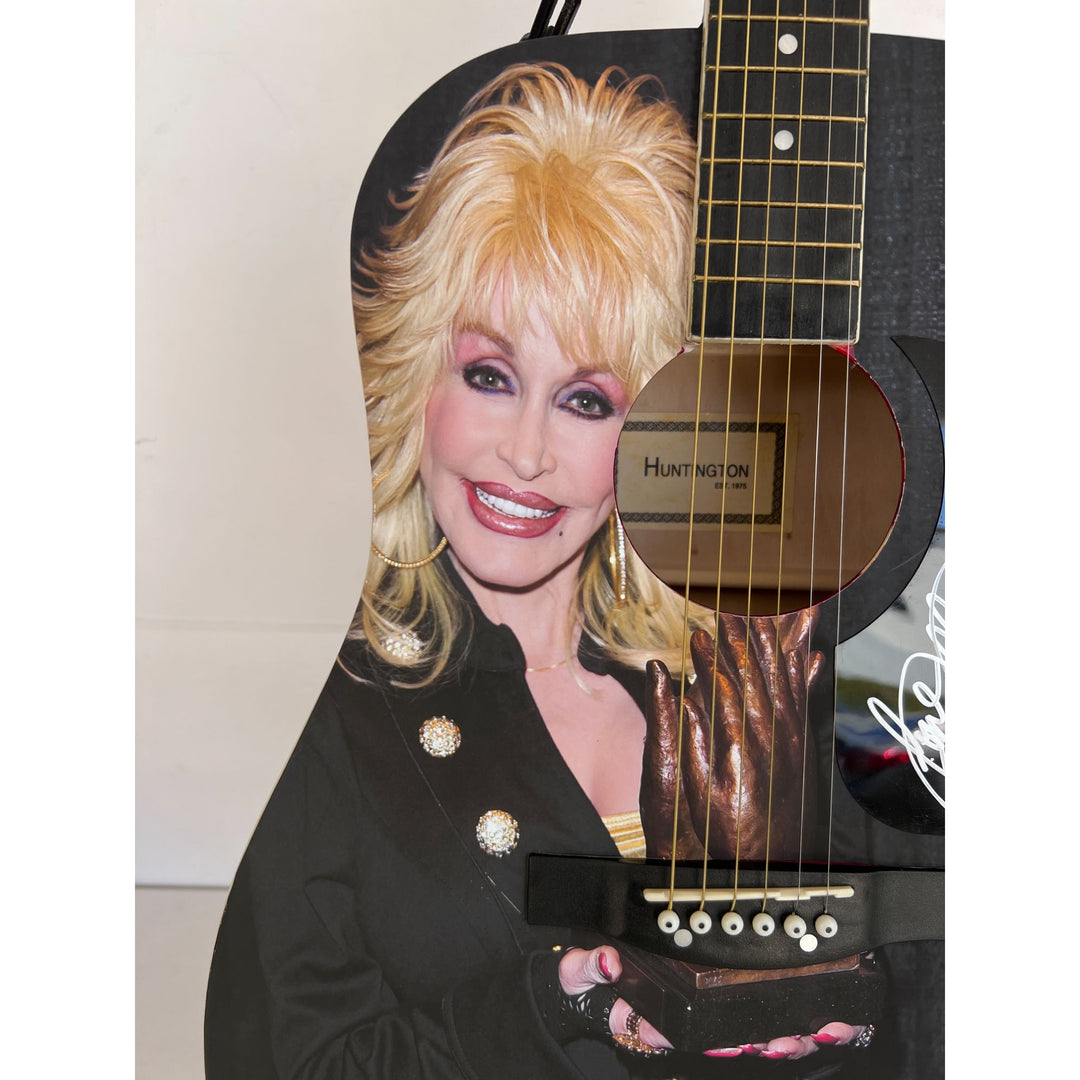 Dolly Parton (one of a kind ) full size acoustic guitar signed with proof .
