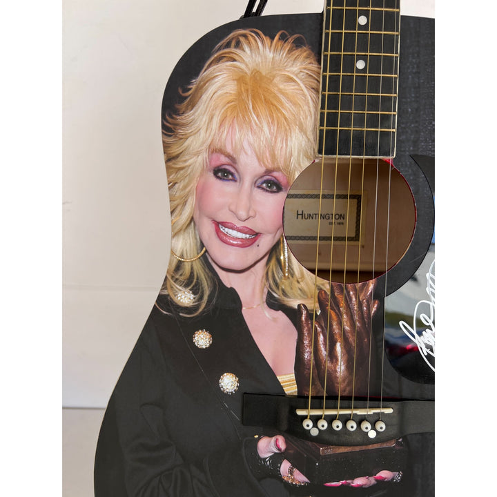 Dolly Parton (one of a kind ) full size acoustic guitar signed with proof .