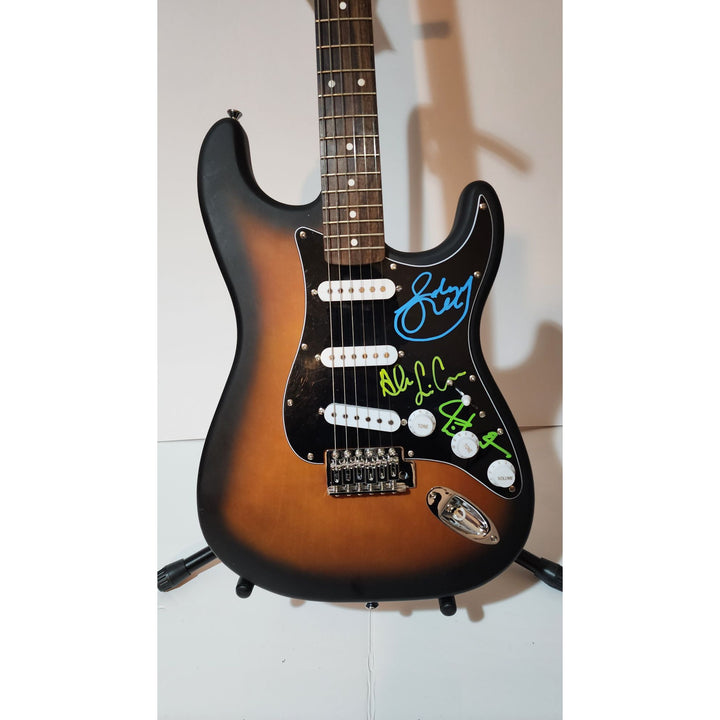 Rush Band signed Neil Peart, Geddy Lee, Alex Lifeson vintage black Fender Stratocaster full size electric guitar signed with proof