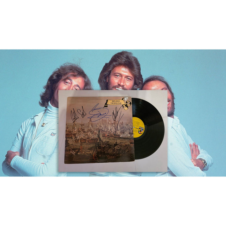Barry, Robin and Maurice Gibb Bee Gees "Trafalgar" LP signed with proof.