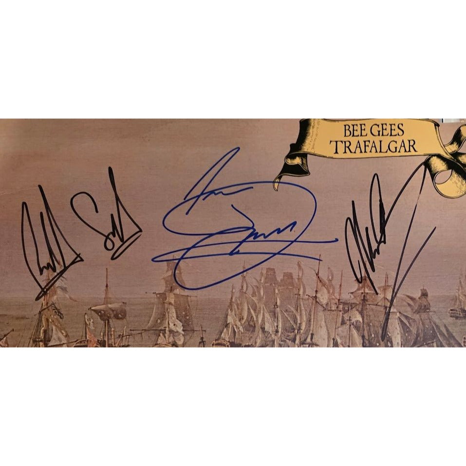 Barry, Robin and Maurice Gibb Bee Gees "Trafalgar" LP signed with proof.